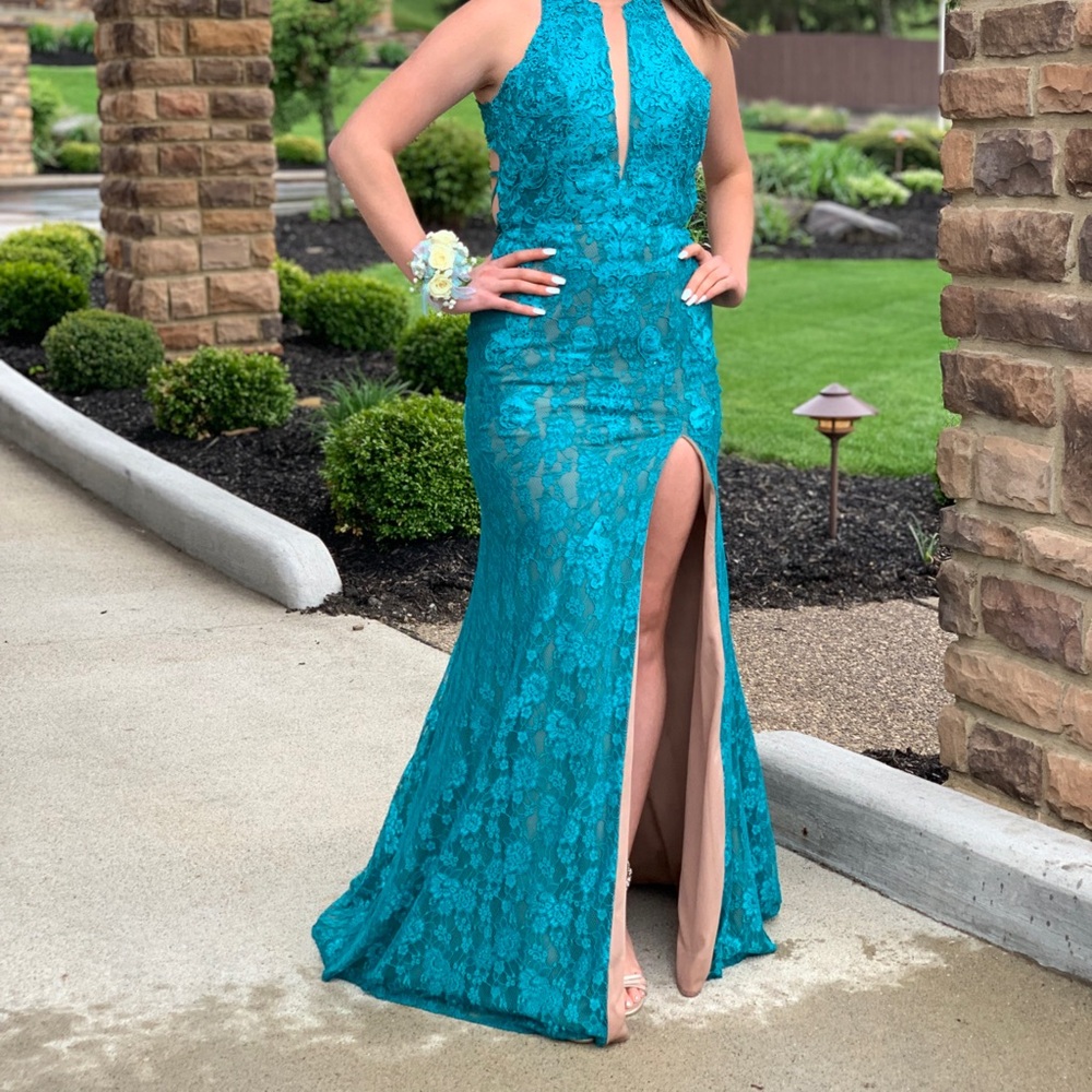 Morilee blue prom dress with open back and high leg slit in size 5/6
